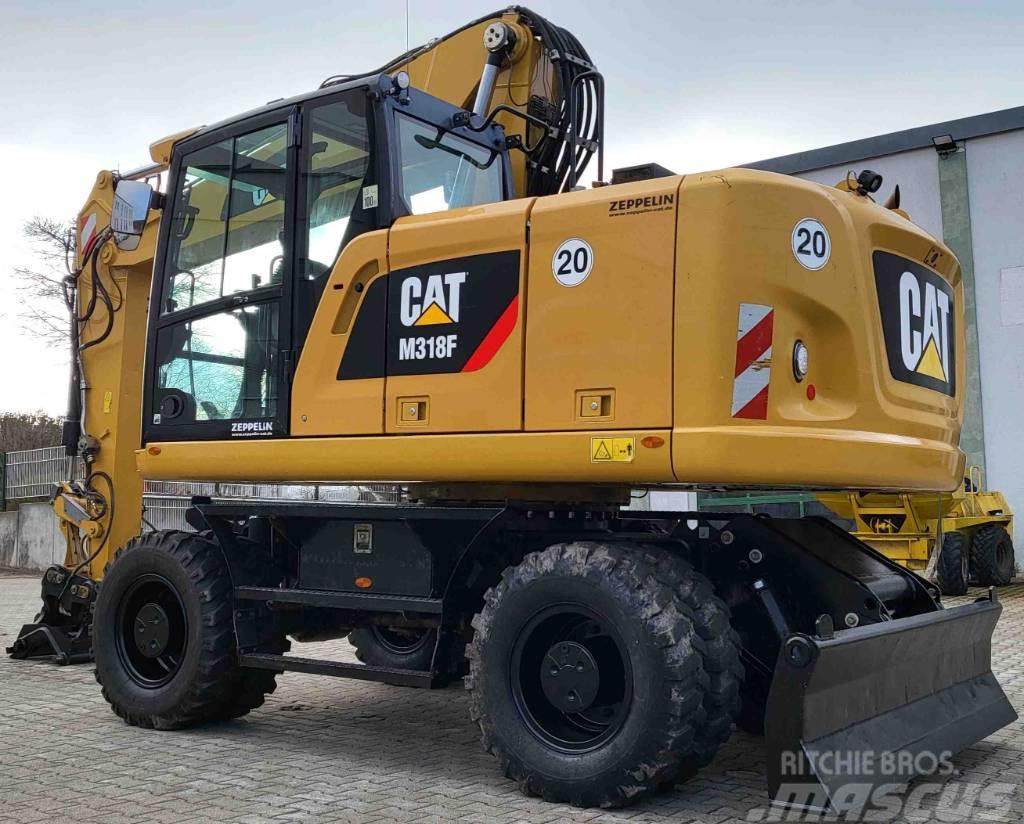 CAT M 318 F, top Zustand, Finanzierung Wheeled excavators