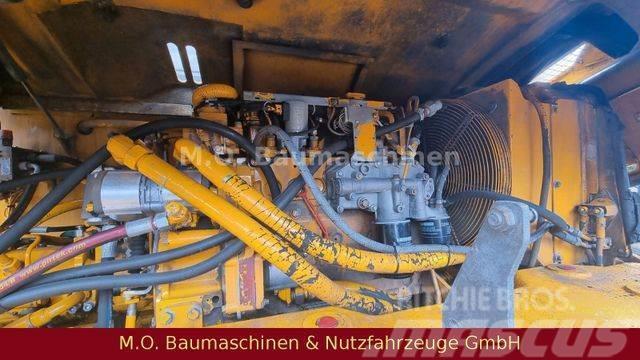 Liebherr A 312 / VSA / Schalengreifer / Wheeled excavators