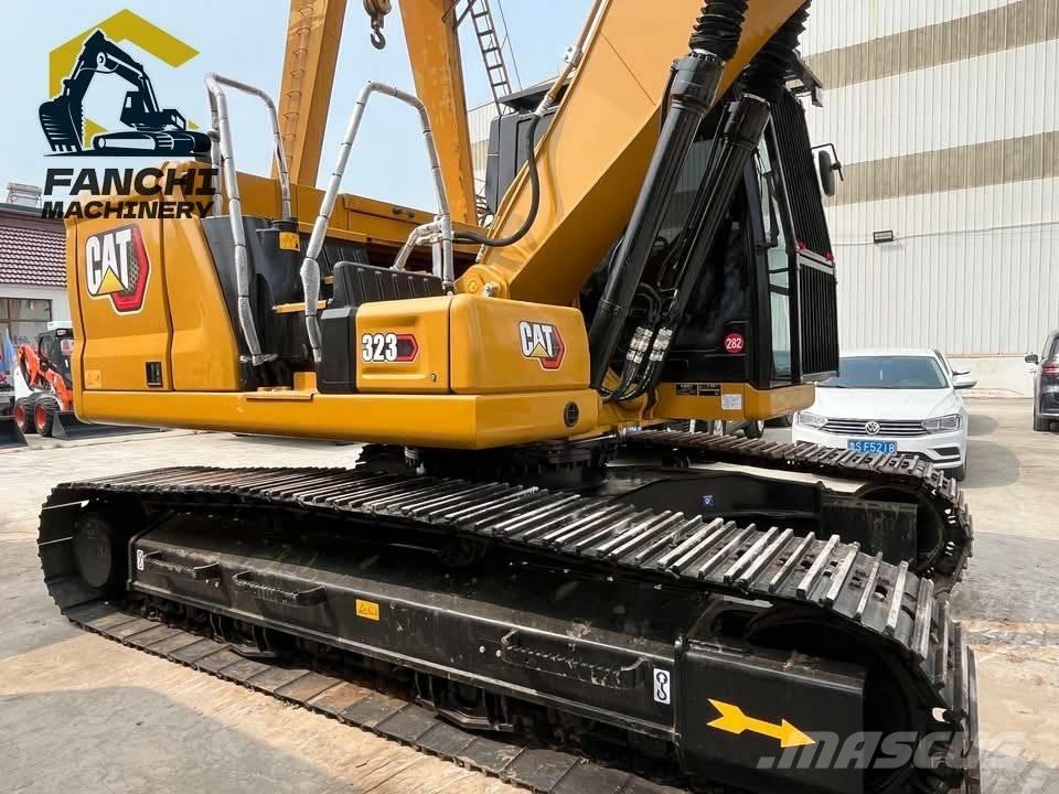 CAT 323 Гусеничні екскаватори