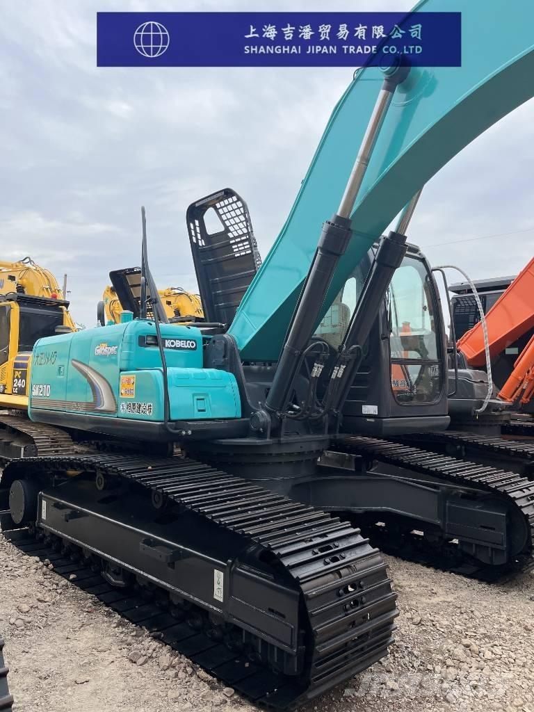 Kobelco SK 210 Гусеничні екскаватори