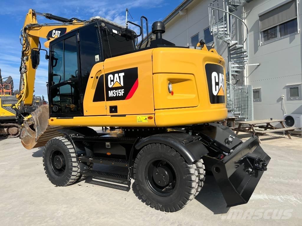 CAT M 315 F Колісні екскаватори