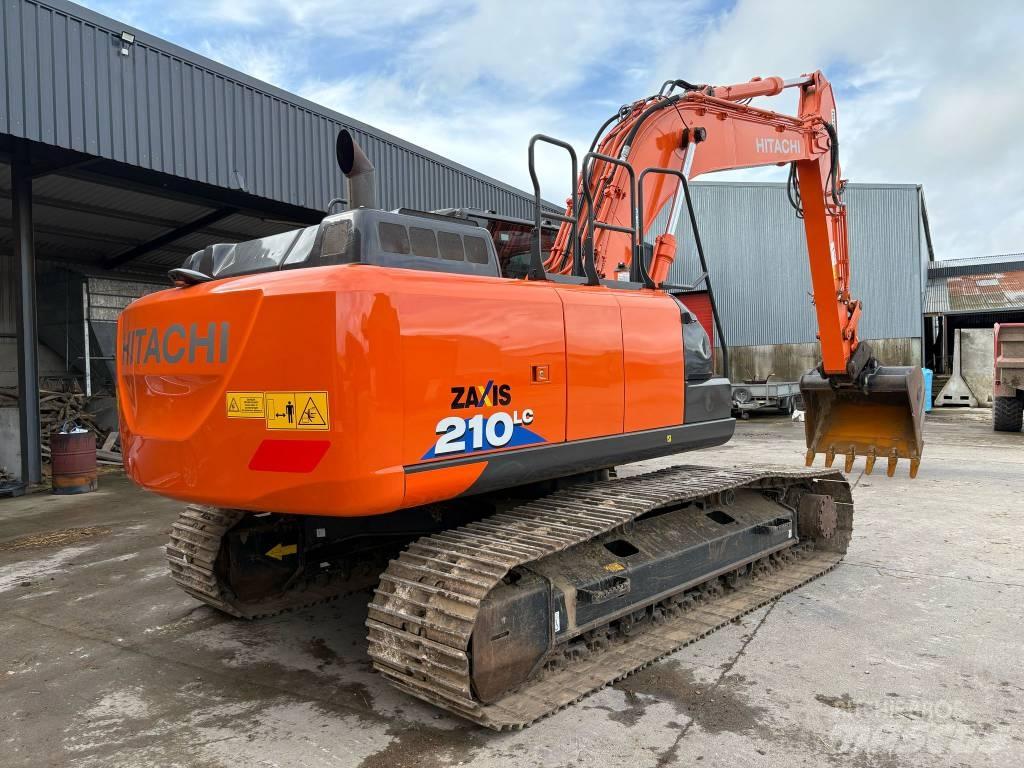 Hitachi 210LC Гусеничні екскаватори