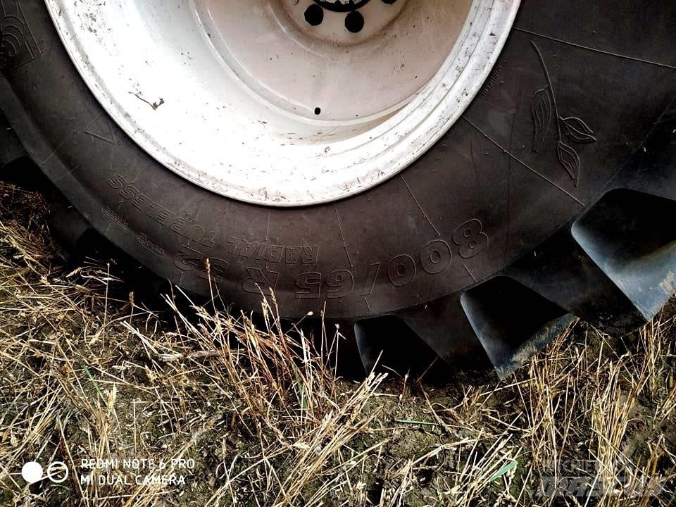 New Holland TC 5.70 Зернозбиральні комбайни