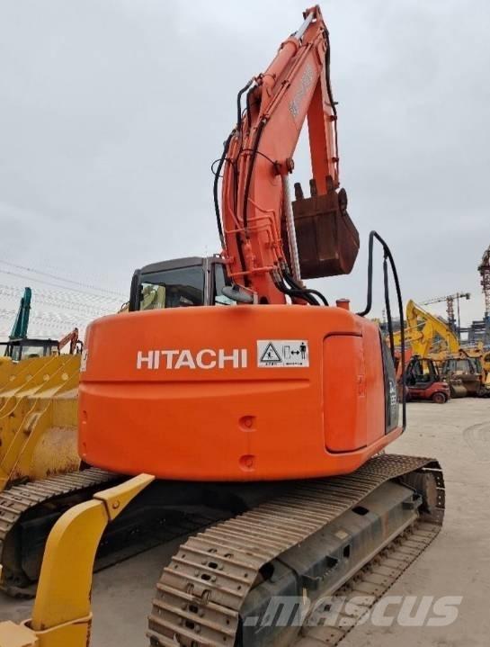 Hitachi ZX 135 US Гусеничні екскаватори