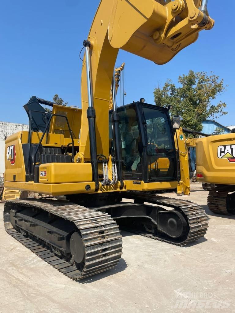 CAT 320 GC Колісні екскаватори
