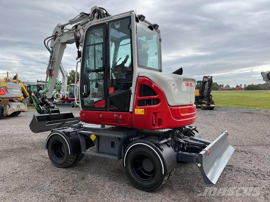 Takeuchi TB 370 W Колісні екскаватори