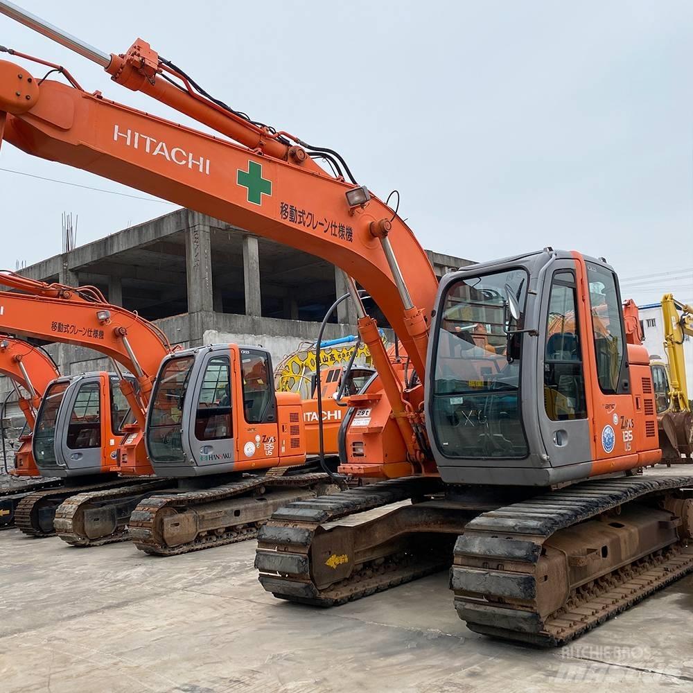 Hitachi 135 Гусеничні екскаватори