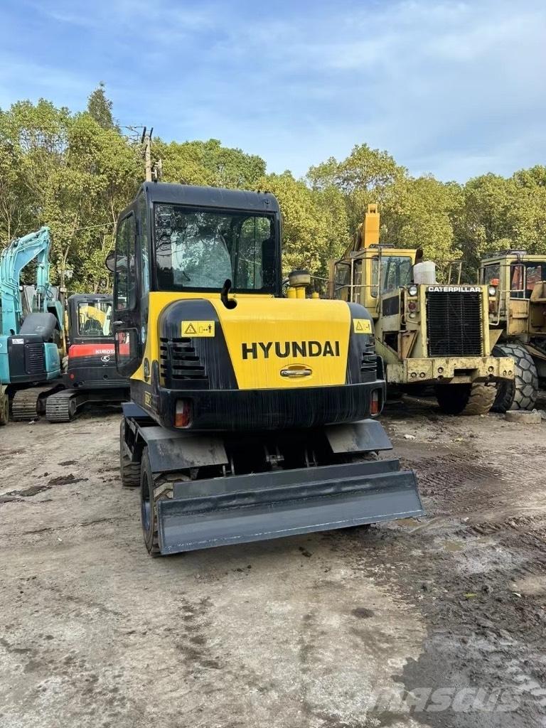 Hyundai 60 W-7 Колісні екскаватори