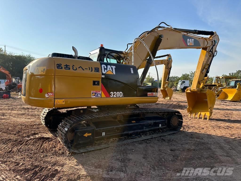 CAT 320 DL Гусеничні екскаватори