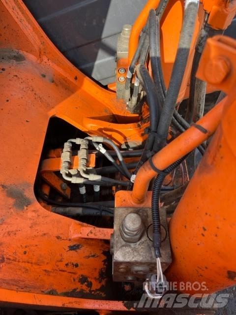 Doosan DX 140 LC Гусеничні екскаватори