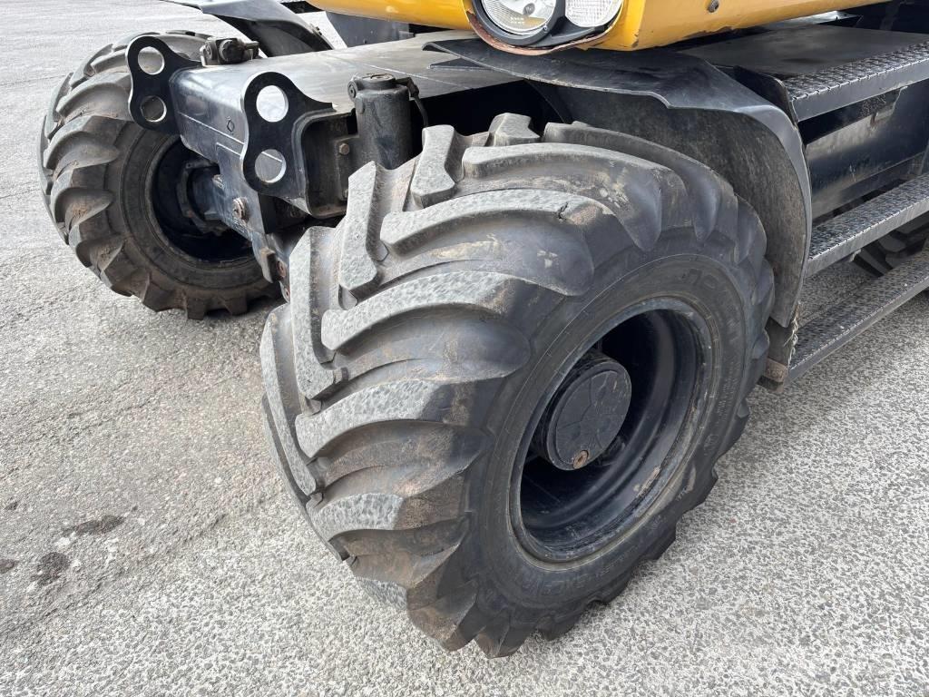 CAT M 313 D Колісні екскаватори