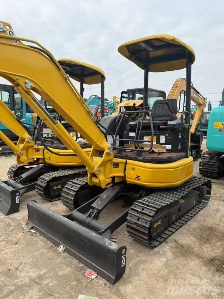 Komatsu 30 Гусеничні екскаватори