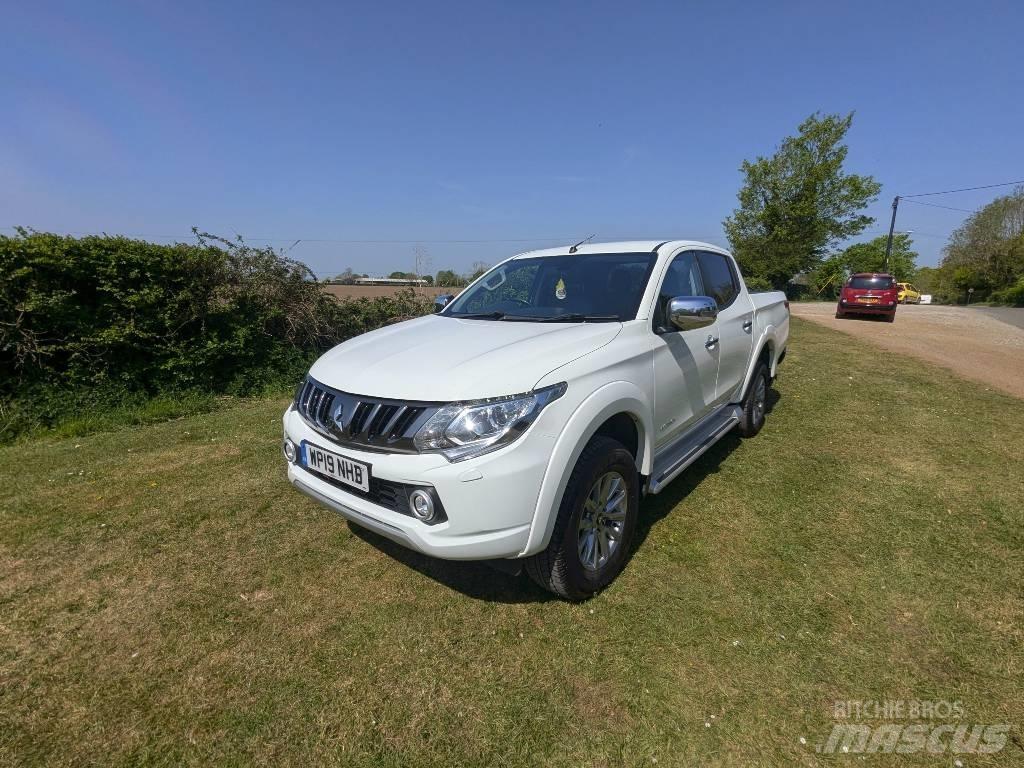 Mitsubishi L 200 Пікапи / Бічне розвантаження