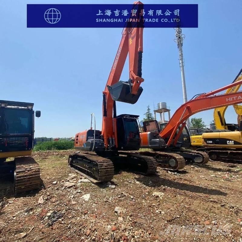 Hitachi ZX 210 Гусеничні екскаватори