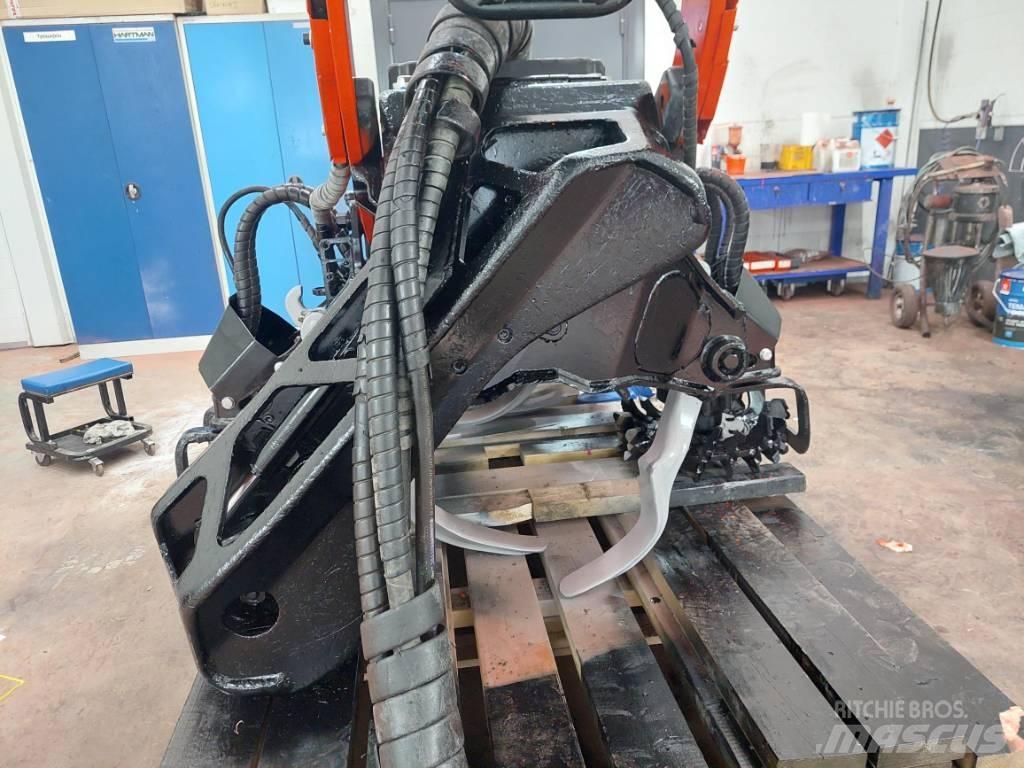 Komatsu C123 Валочні головки