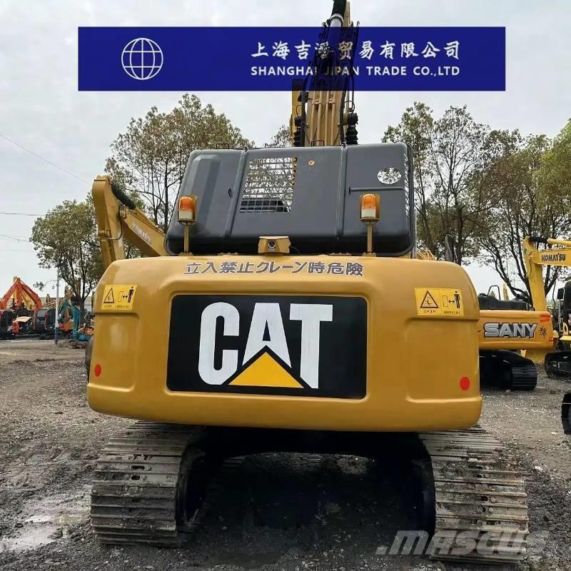 CAT 323 D Гусеничні екскаватори
