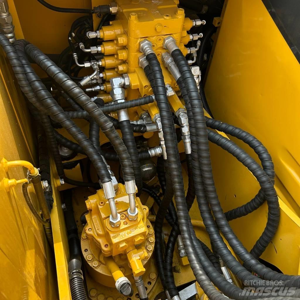 Komatsu 110 Гусеничні екскаватори