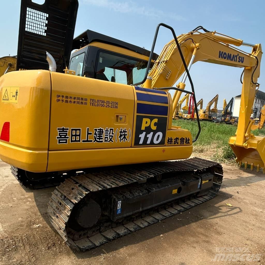 Komatsu 110 Гусеничні екскаватори