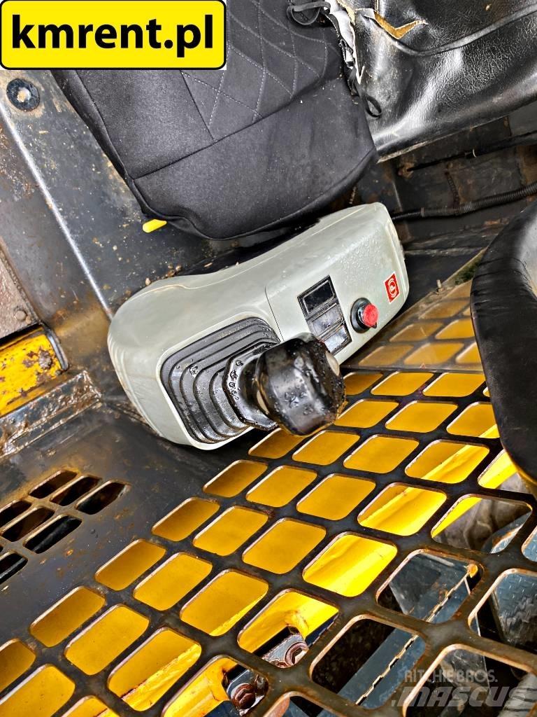 Komatsu SK 815 Міні-навантажувачі