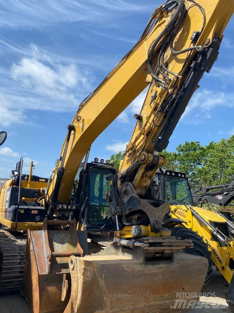 CAT 323 EL Гусеничні екскаватори