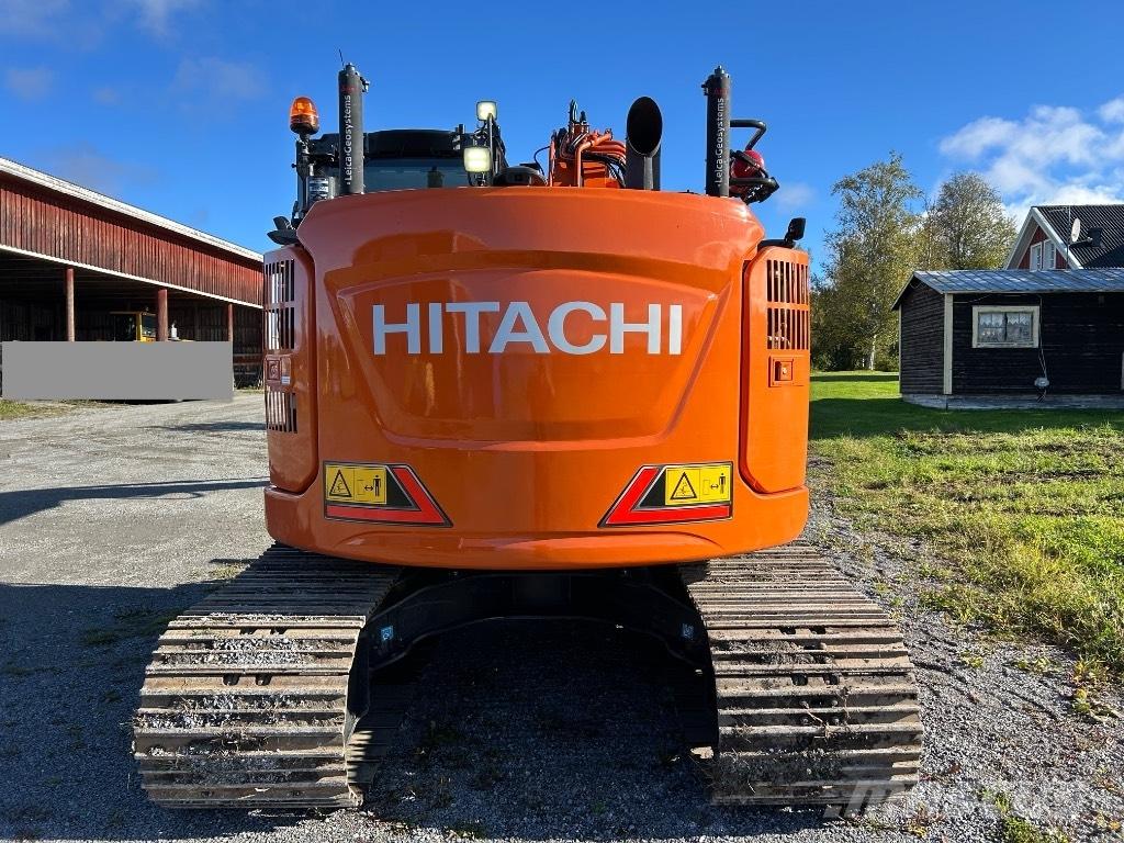 Hitachi ZX 135 US-7 Гусеничні екскаватори