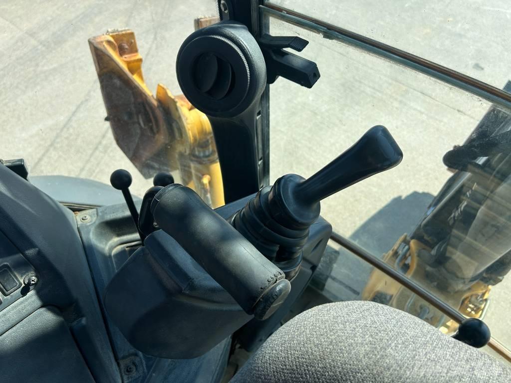 John Deere 310K Екскаватори-навантажувачі