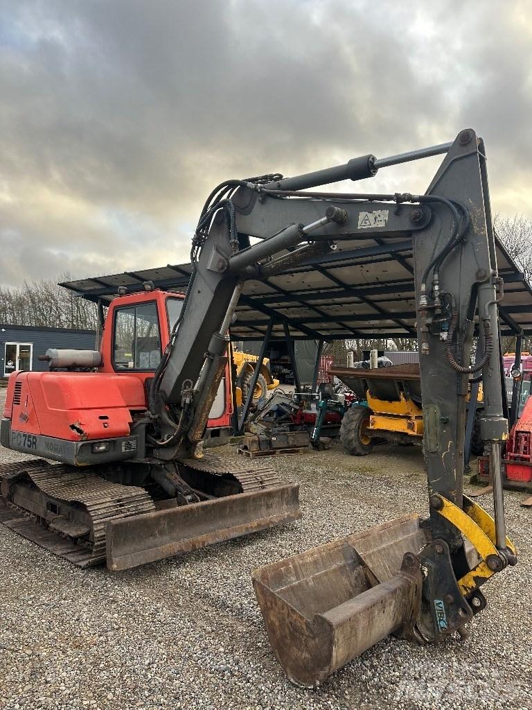 Komatsu PC 75 Середні екскаватори 7т. - 12т.