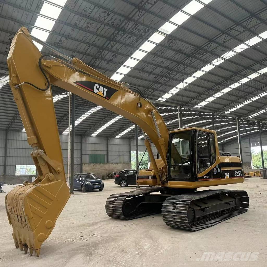 CAT 320B Гусеничні екскаватори