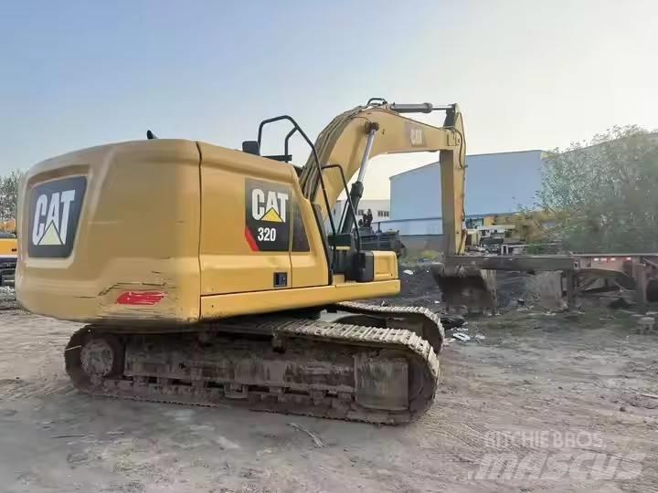CAT CAT323GX Гусеничні екскаватори