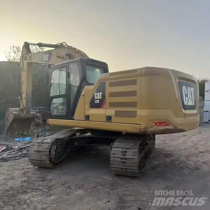 CAT CAT323GX Гусеничні екскаватори