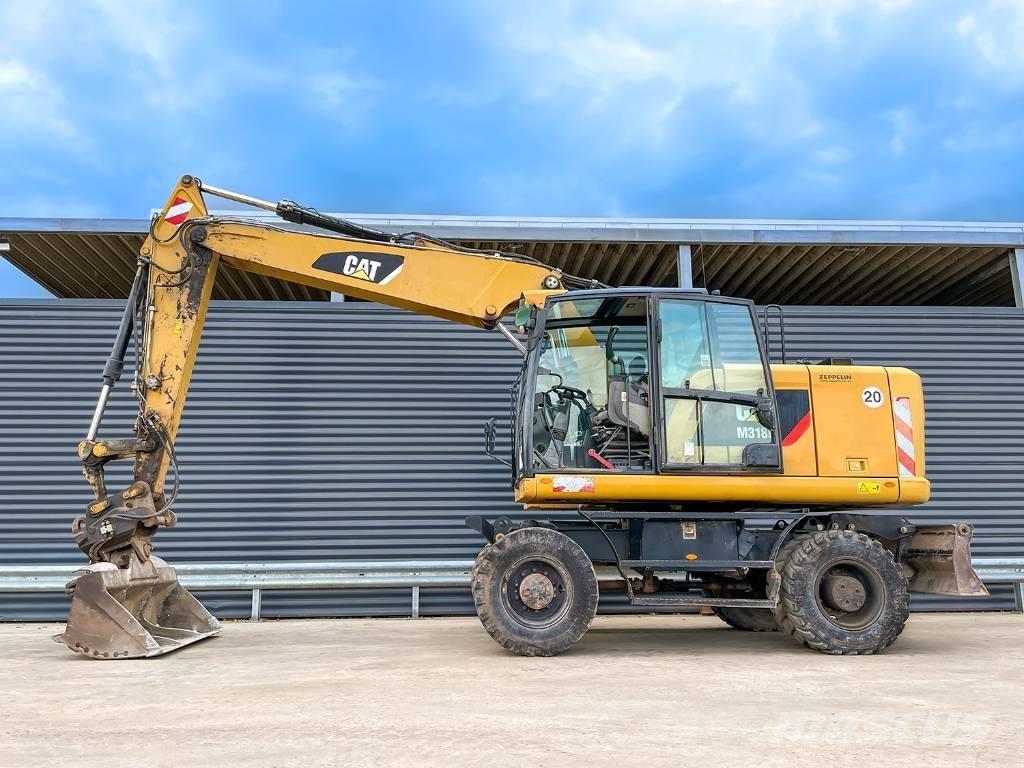 CAT M318F Колісні екскаватори