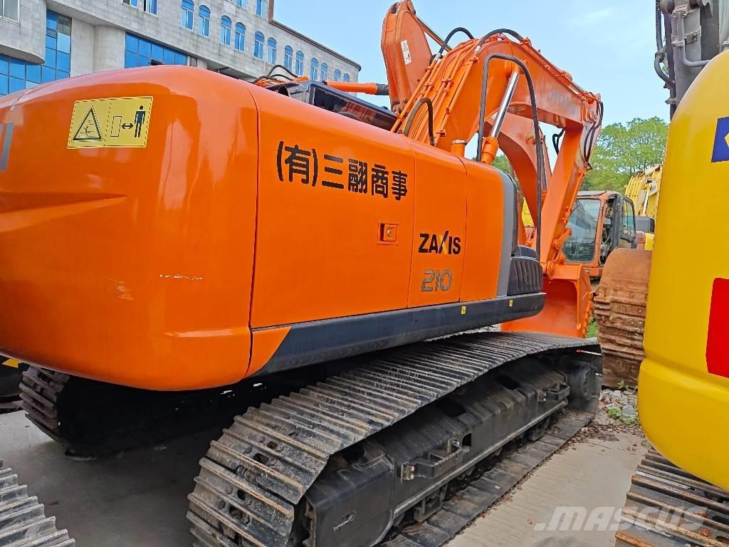 Hitachi ZX 210 Гусеничні екскаватори