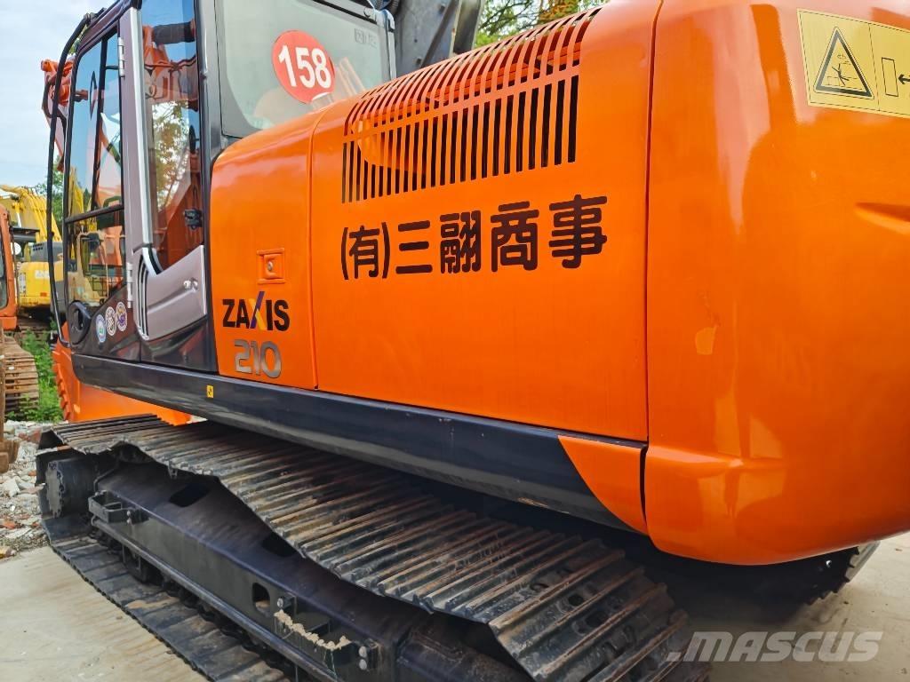 Hitachi ZX 210 Гусеничні екскаватори