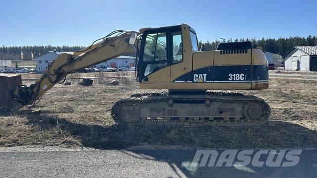 CAT 318 C Гусеничні екскаватори