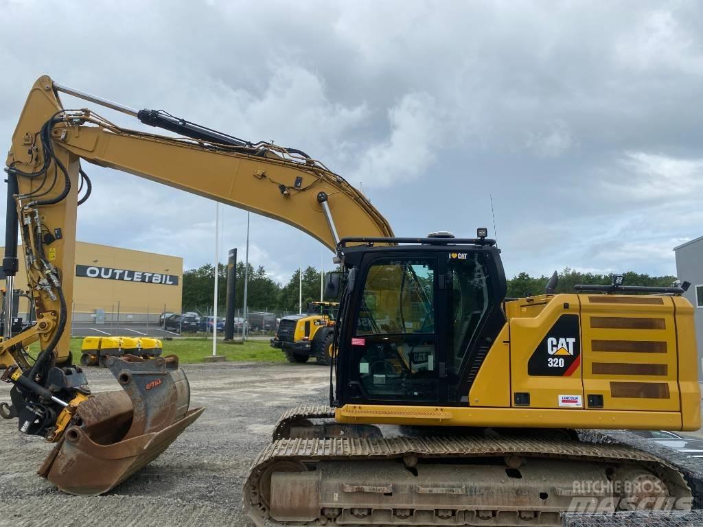 CAT 320 Гусеничні екскаватори