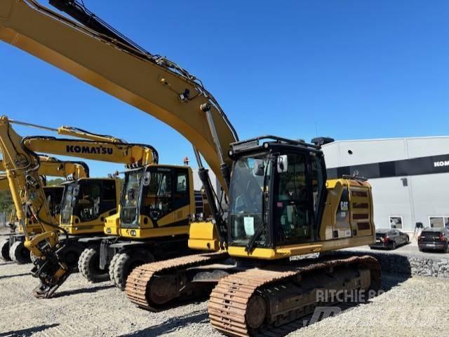 CAT 320 Гусеничні екскаватори