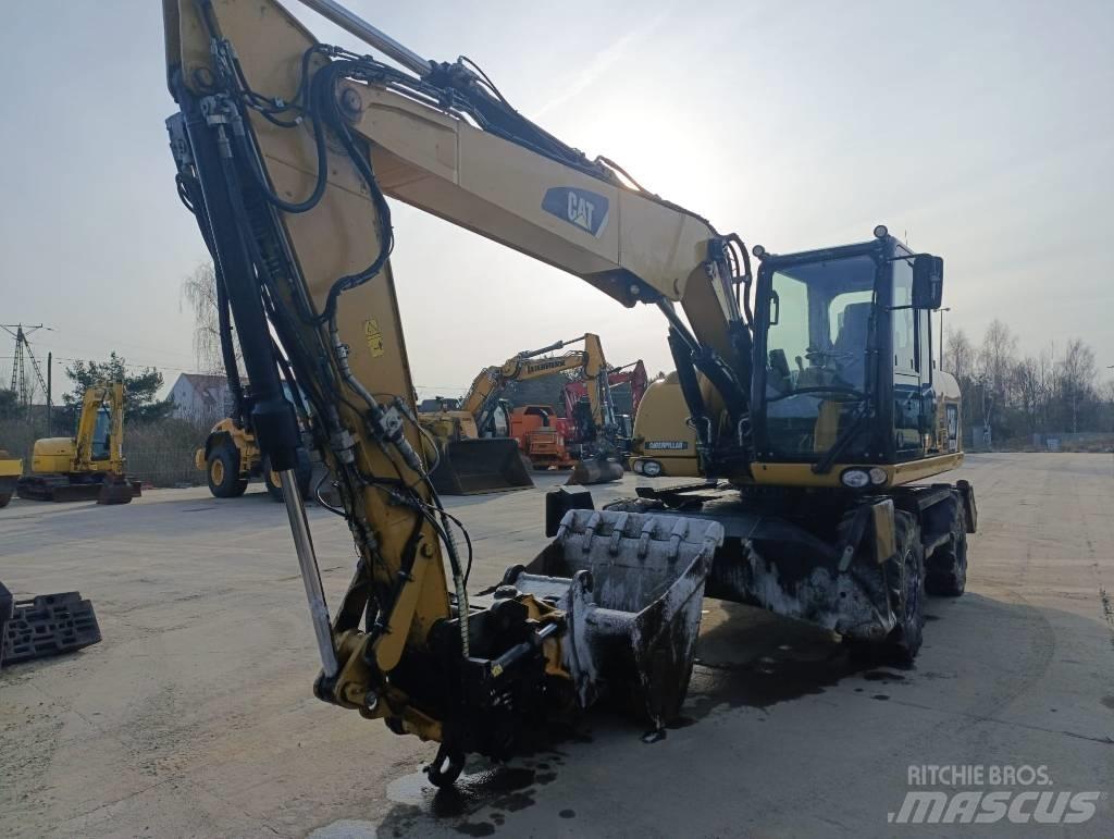 CAT M 313 D Колісні екскаватори