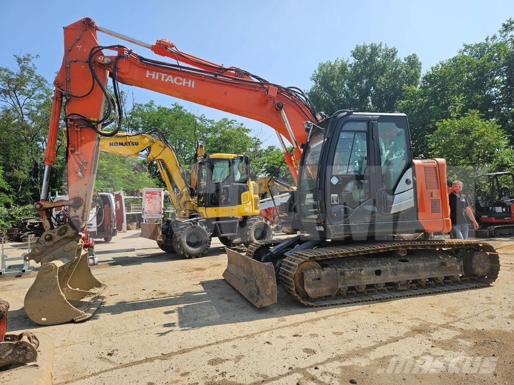 Hitachi ZX 135 US Гусеничні екскаватори