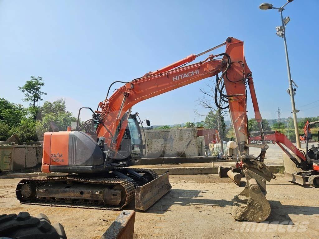 Hitachi ZX 135 US Гусеничні екскаватори