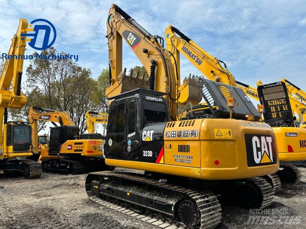 CAT 323 Гусеничні екскаватори
