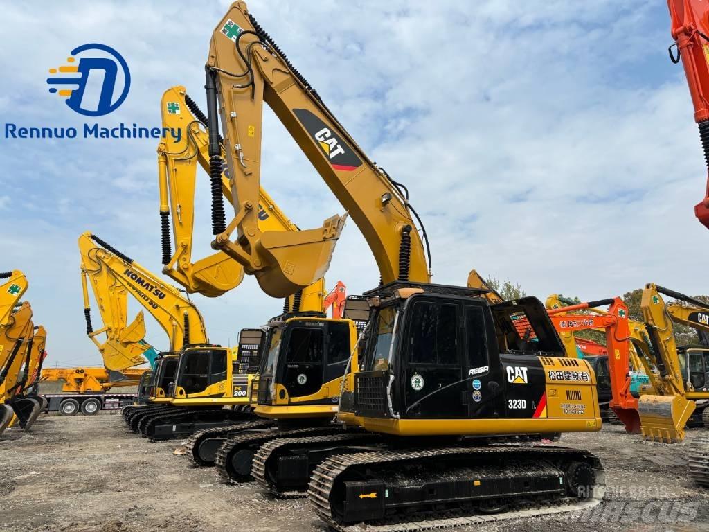 CAT 323 Гусеничні екскаватори