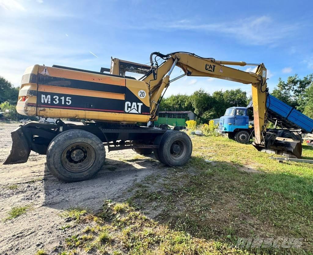 CAT M 315 Колісні екскаватори