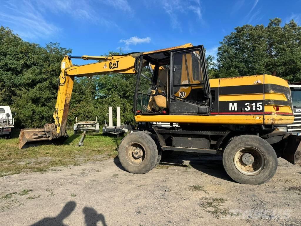 CAT M 315 Колісні екскаватори