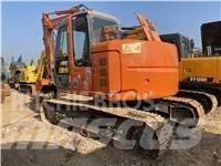 Hitachi ZX 135 US Гусеничні екскаватори