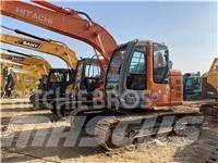 Hitachi ZX 135 US Гусеничні екскаватори