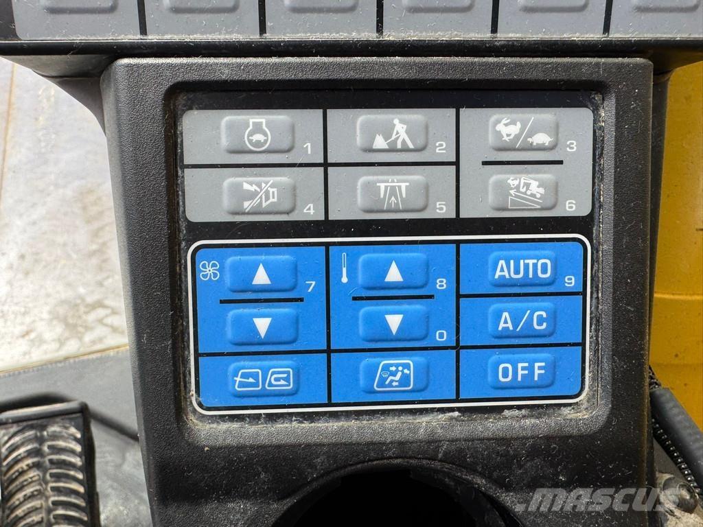 Komatsu PW180-11 Колісні екскаватори