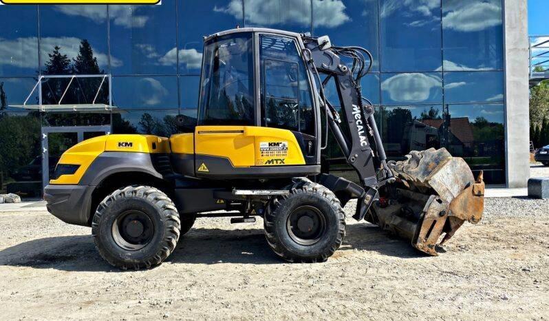 Mecalac 12 M TX Екскаватори-навантажувачі