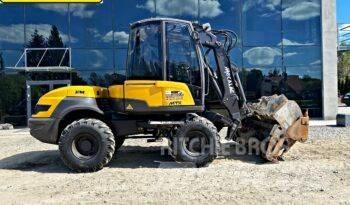 Mecalac 12 M TX Екскаватори-навантажувачі