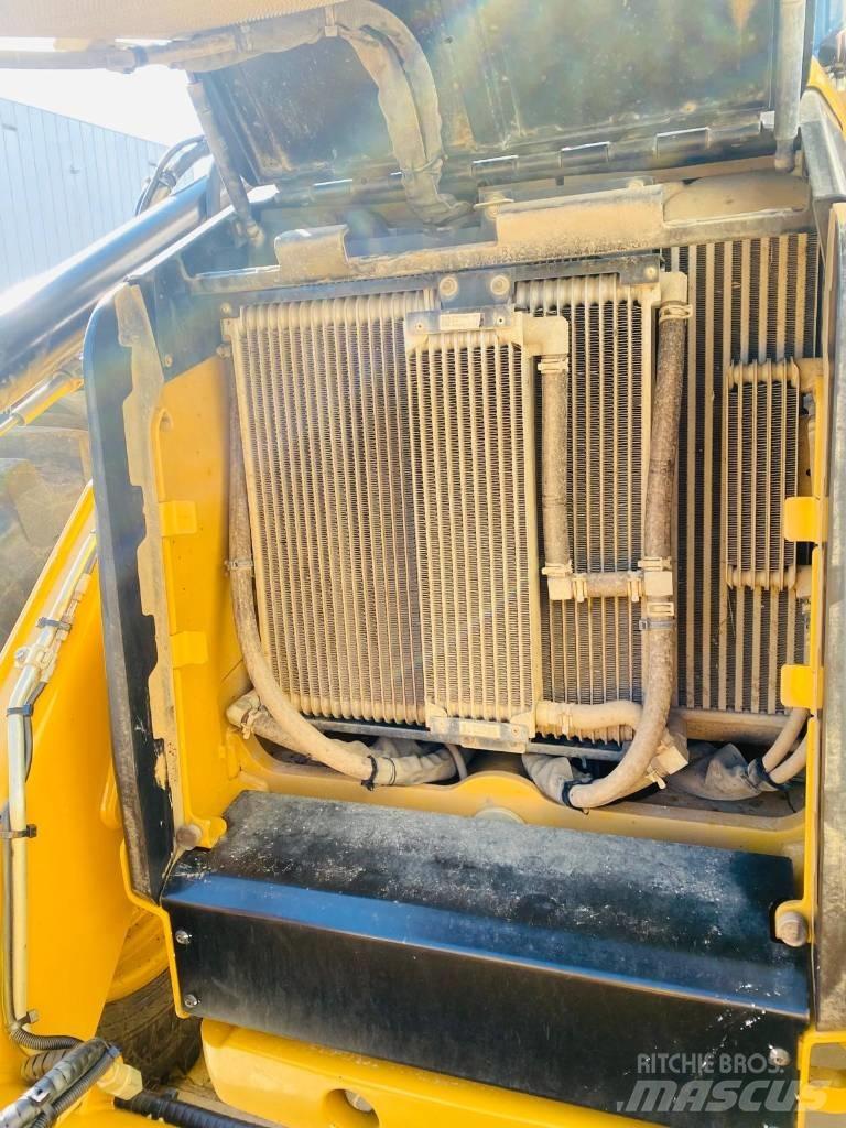 CAT 444  4x4 Екскаватори-навантажувачі