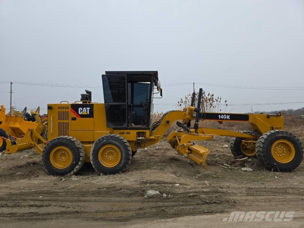 CAT 140K Грейдери